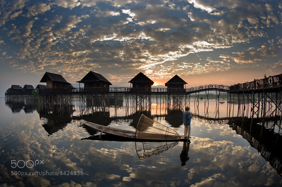 Mirror - Inle Lake and its water chalets in the early morning